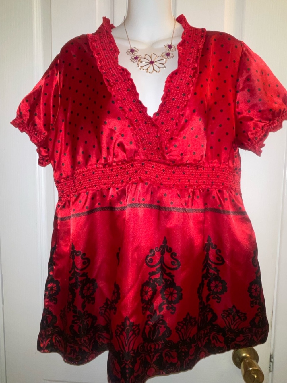 Satin V-Neck Blouse with Black Lace Print at the hem with small black dots